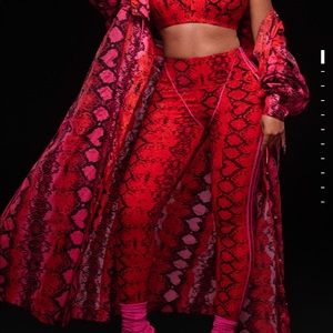 IVY PARK all over print tights size medium. Red Snake print